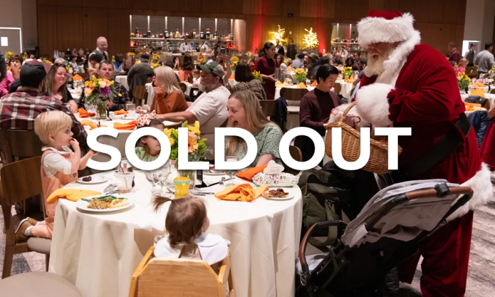 Family dining in Canyon Ballroom while being greeted by Santa. 