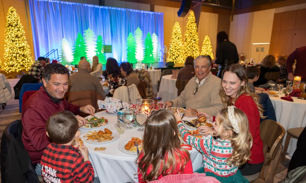 Family dining in Canyon Ballroom during Christmas. 