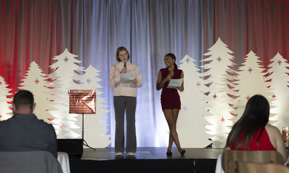 Two women on stage at Holiday Spectacular.