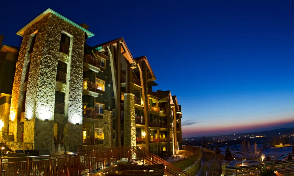 Grand Cascades Lodge at nighttime. 