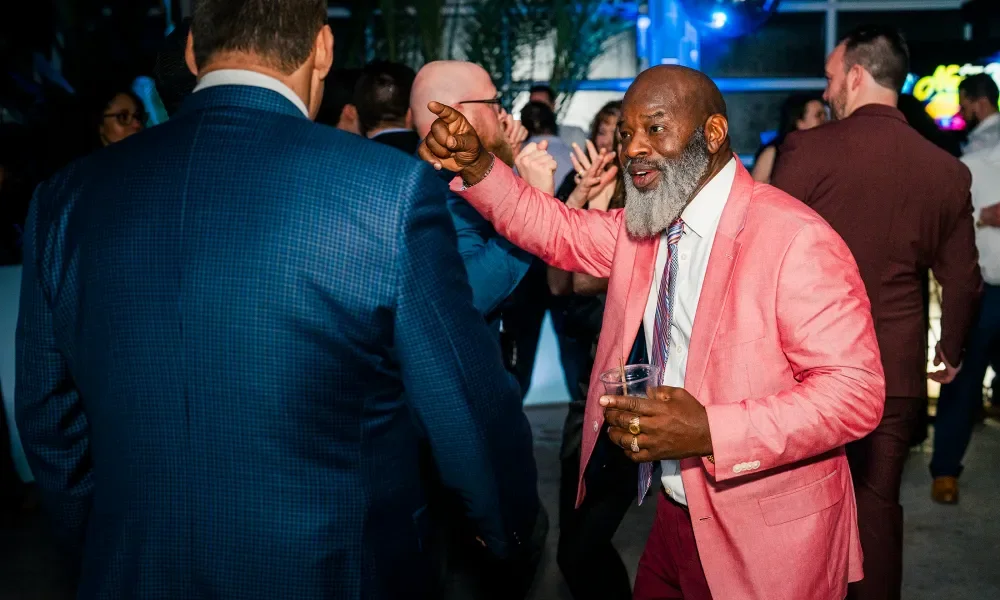 Man in pink suit in Biosphere. 