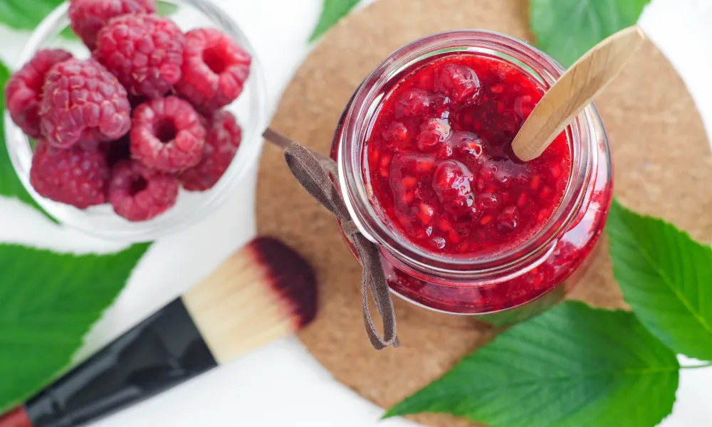 Mashed berries in a jar. 