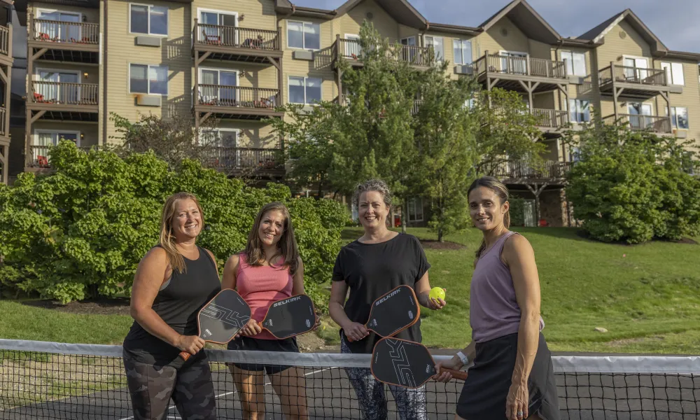 Group of girls playing pickleball
