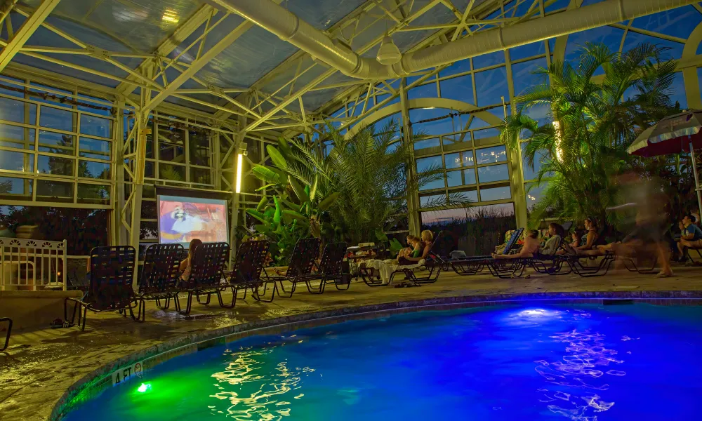 Movie screen in tropical Biosphere pool complex.