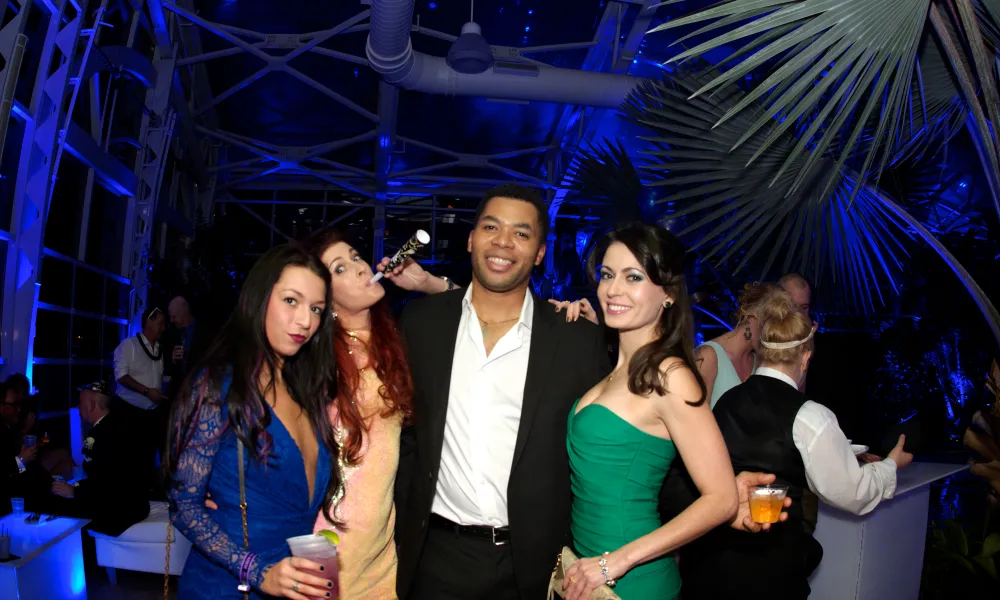 Group of friends celebrating New Year's Eve in Biosphere.