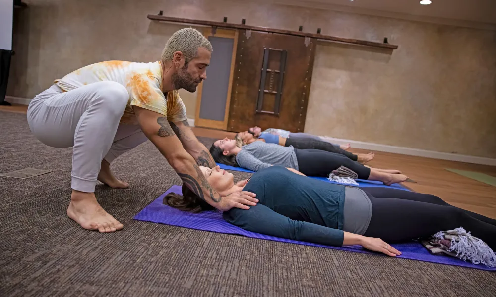 Bryan Paul teaching yoga class