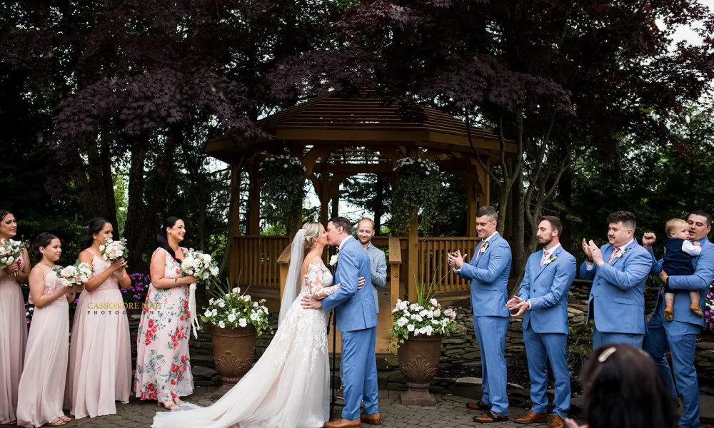Bride and Groom kissing.