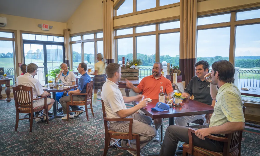 Men enjoying Scotch at Owen's Pub in Ballyowen Golf Club