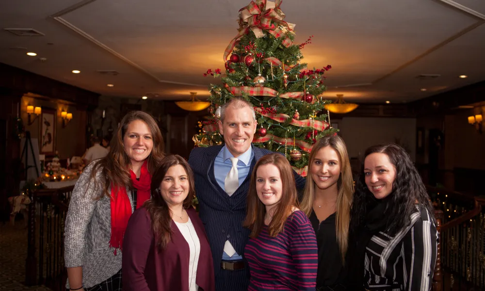 Employees of Crystal Springs Resort enjoying the company holiday party.