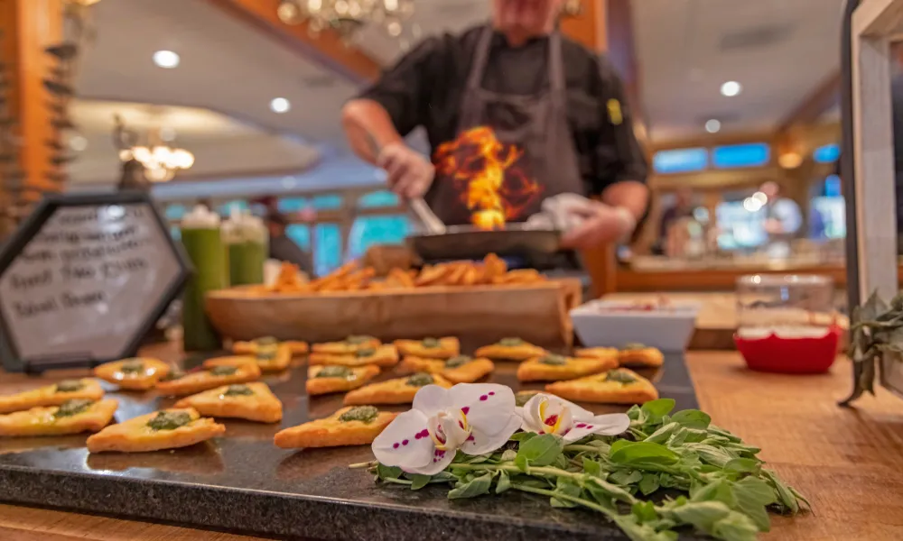 Chef cooking fresh food at catered event