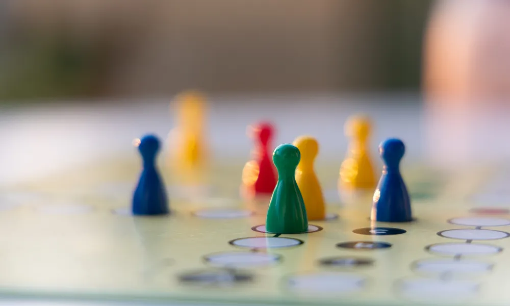 Colorful board game pieces.