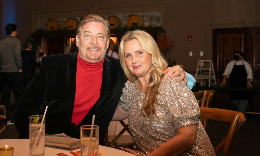 Couple dressed up for NYE. 