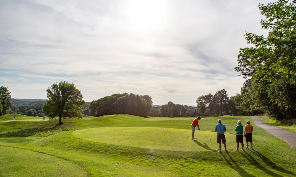 Four golfers on Black Bear golf course.