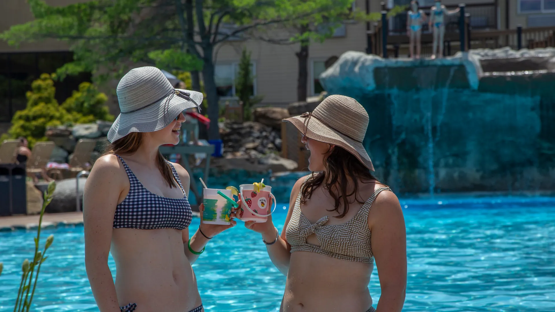 Girlfriends enjoying rum buckets at Minerals Pool