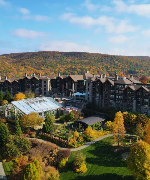 Grand Cascades Lodge exterior during fall. 