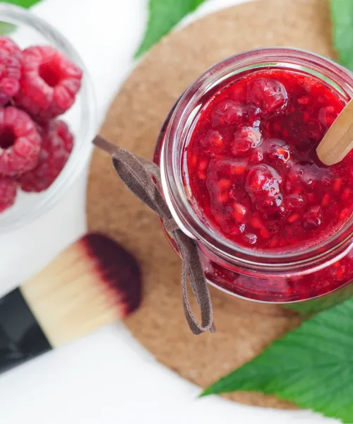 Mashed berries in a jar. 