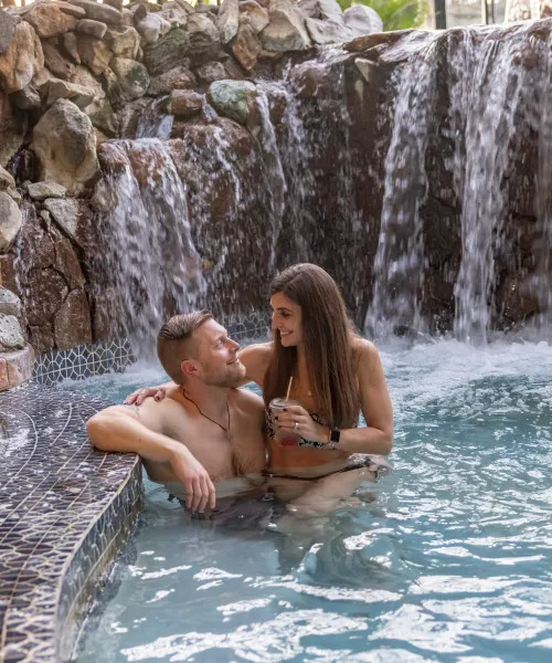 Couple in hot tub at Minerals Hotel