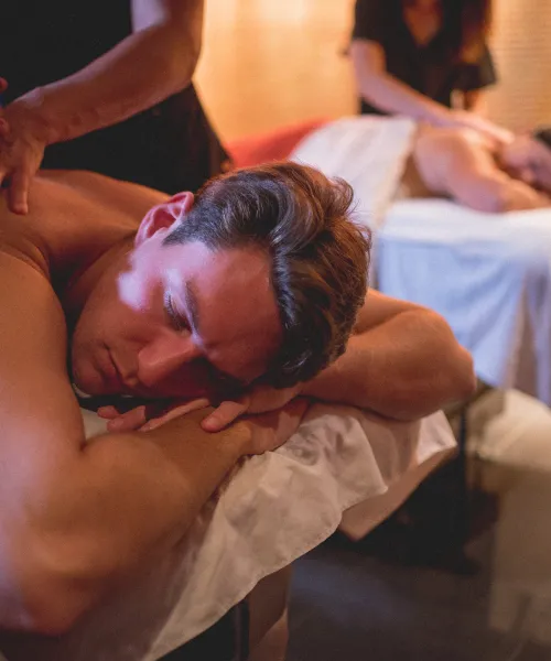 Two people getting massaged.