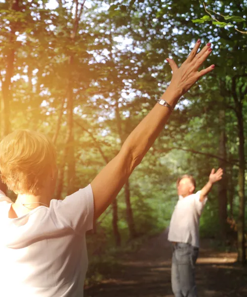 Couple forest bathing at a resort in Sussex County
