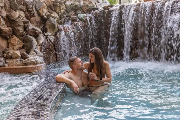 Couple in hot tub at Minerals Hotel