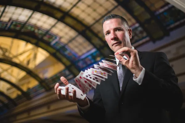 John Graham shuffling deck of cards.