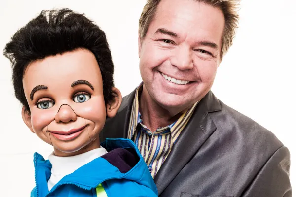 John Pizzi holding his puppet.