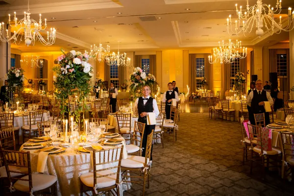 Banquet servers during a wedding in the Emerald Ballroom