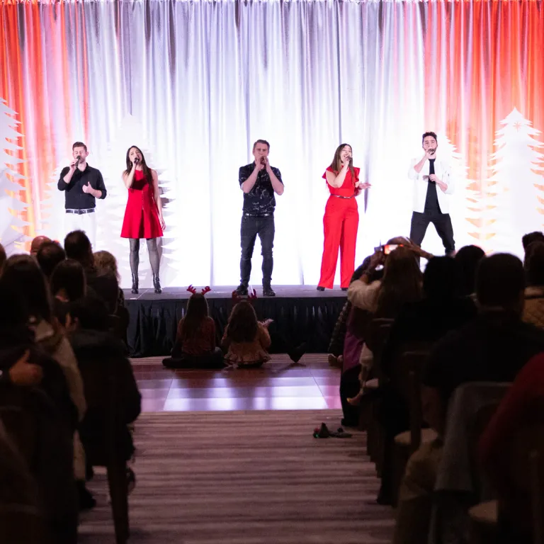 5-Singers-On-Stage-Holiday-Concert
