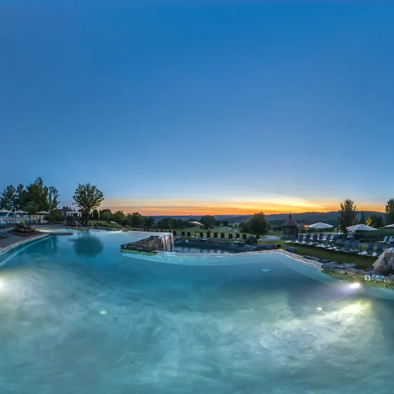 Panoramic view of a sunset at vista 180 pool.