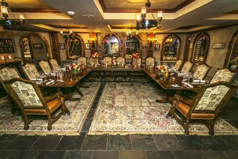 Wine cellar dining room setup. 