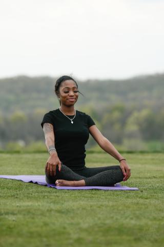 yoga and mediation outside on grass
