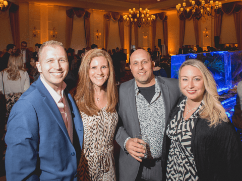 Group of friends enjoying New Year's Eve party.