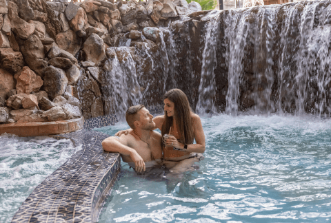 Couple in hot tub at Minerals Hotel