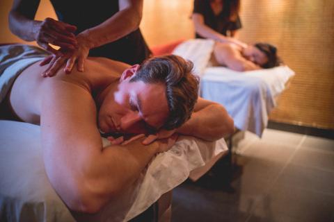 Two people getting massaged.