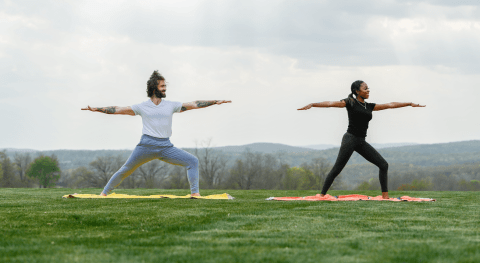 Couple doing yoga at a resort close to NYC