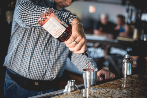 Bartender making a cocktail at Kites Restaurant