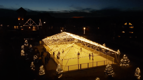 Glice skating rink at night time.