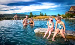 Family in Vista 180 pool.