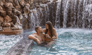 Couple in hot tub at Minerals Hotel