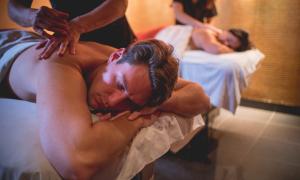 Two people getting massaged.