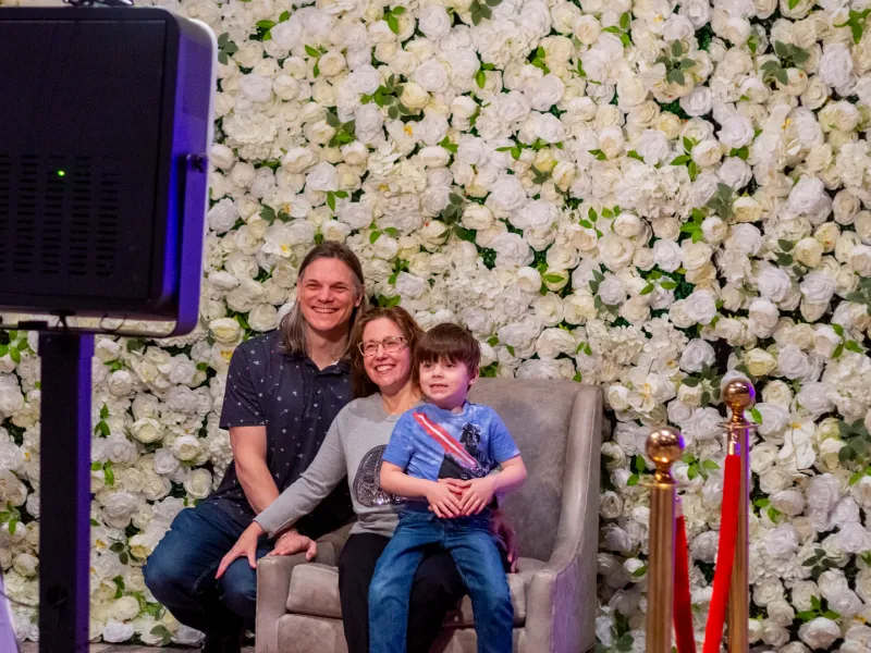 Family getting their photo taken at Mother's Day Canyon Brunch.