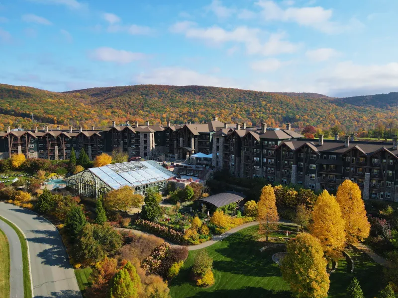Grand Cascades Lodge exterior during fall. 