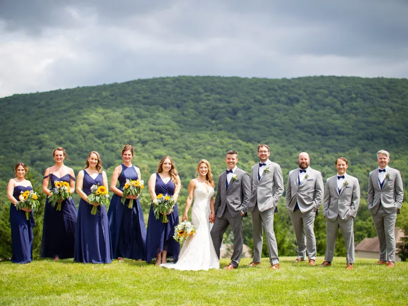 Wedding party standing together at Grand Cascades Lodge
