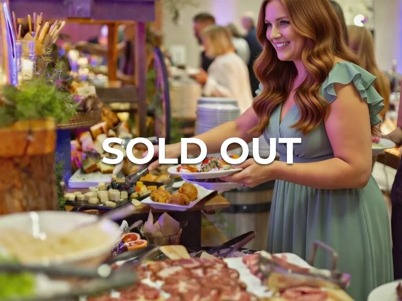 Woman getting food from buffet in Canyon.