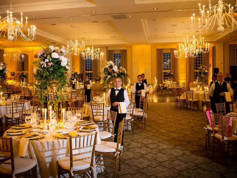 Banquet servers during a wedding in the Emerald Ballroom