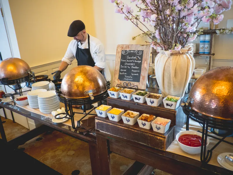 Chef standing at omelet station.