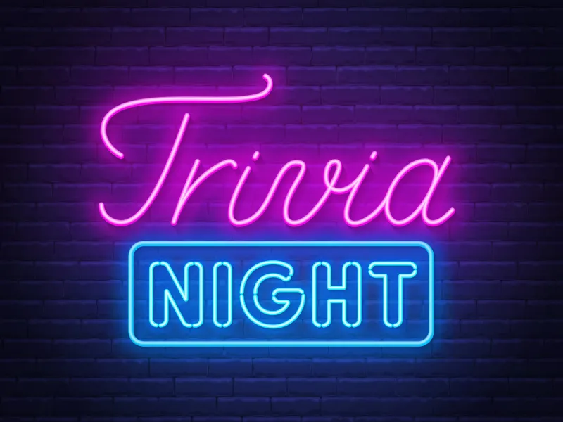 Neon sign that says trivia night.