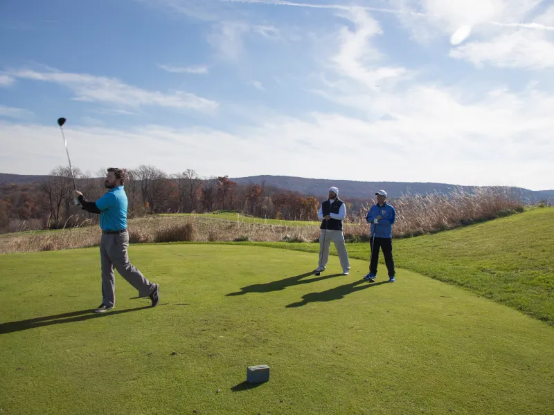 Three guys on Ballyowen Golf Course in fall